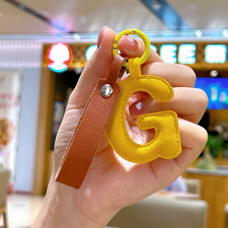 من الألف إلى الياء سلسلة مفاتي - مراجعة Monogram Keychain Leather وسعره