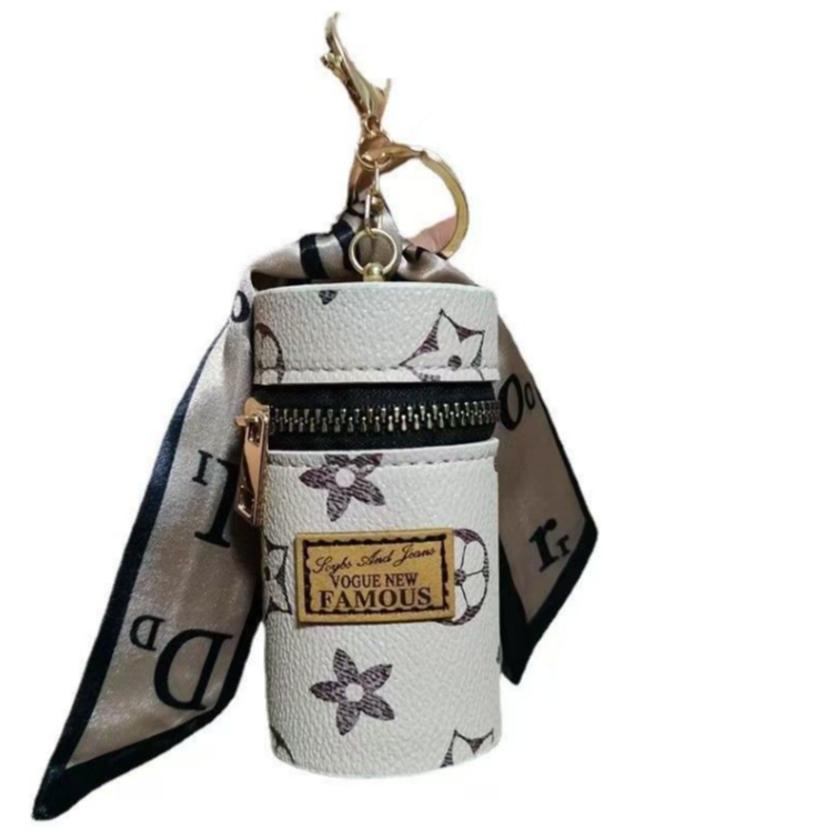 حقيبة صغيرة أسطوانية الشكل بلو - مراجعة Monogram Keychain Leather وسعره